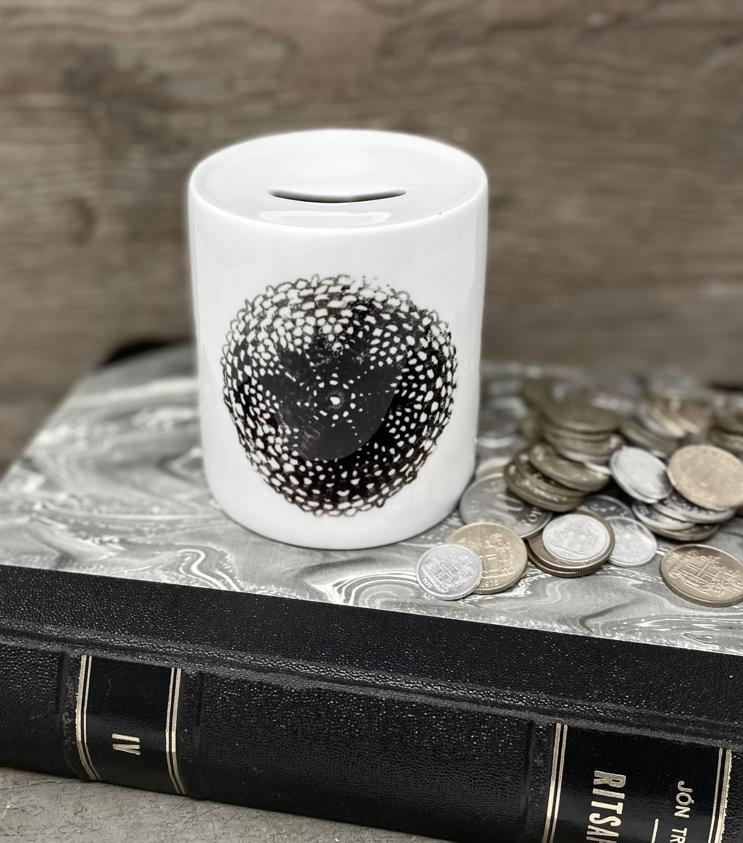 A piggy bank with a fabric pattern
