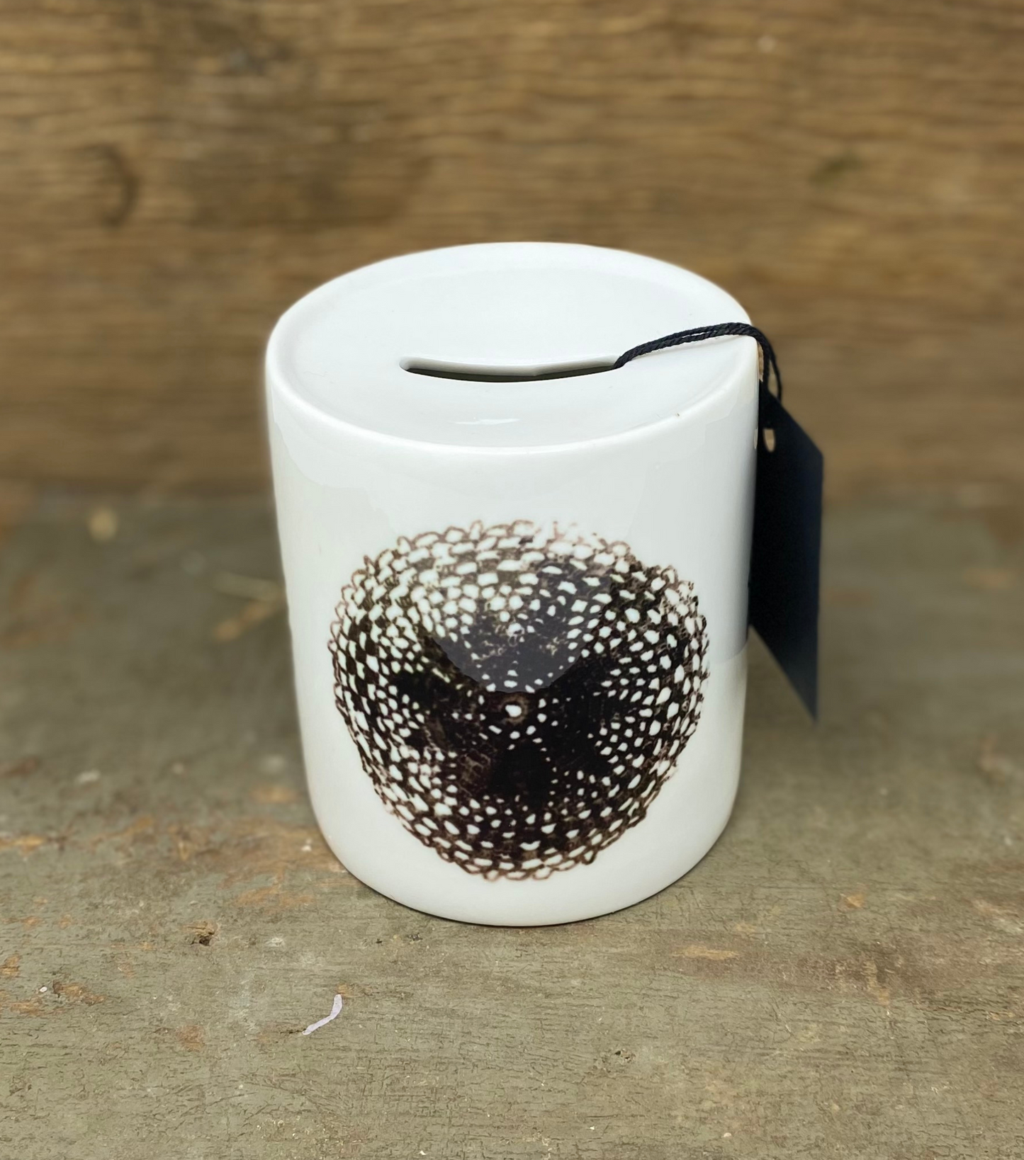 A piggy bank with a fabric pattern